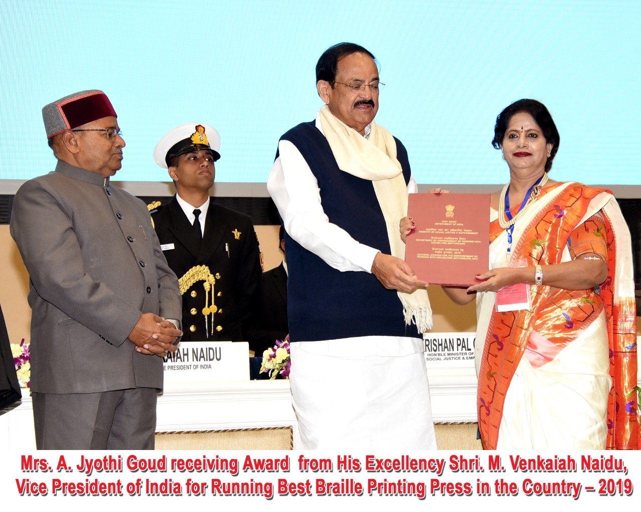 Mrs. Jyothi Goud receiving award from Vice President Venkaiah Naidu